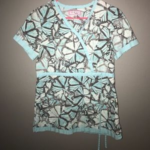 Koi scrub top